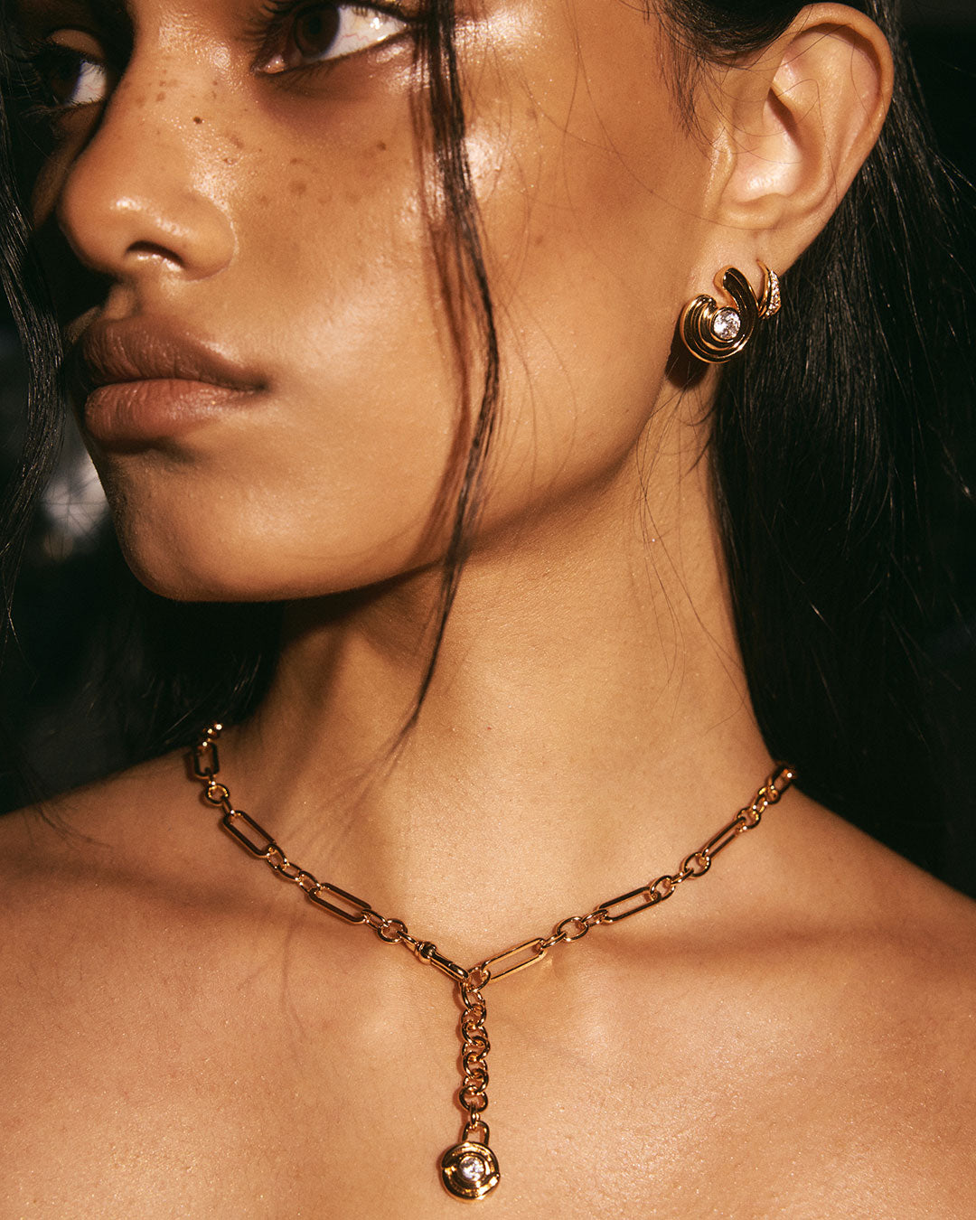Wave Bezel Twist Studs