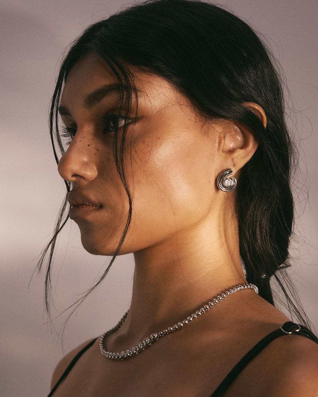 Wave Bezel Twist Studs