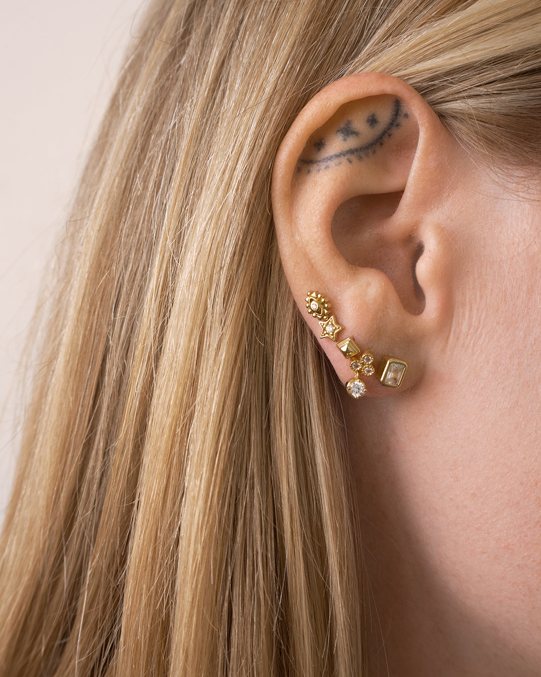 The Metal Step Cut Pyramid Studs