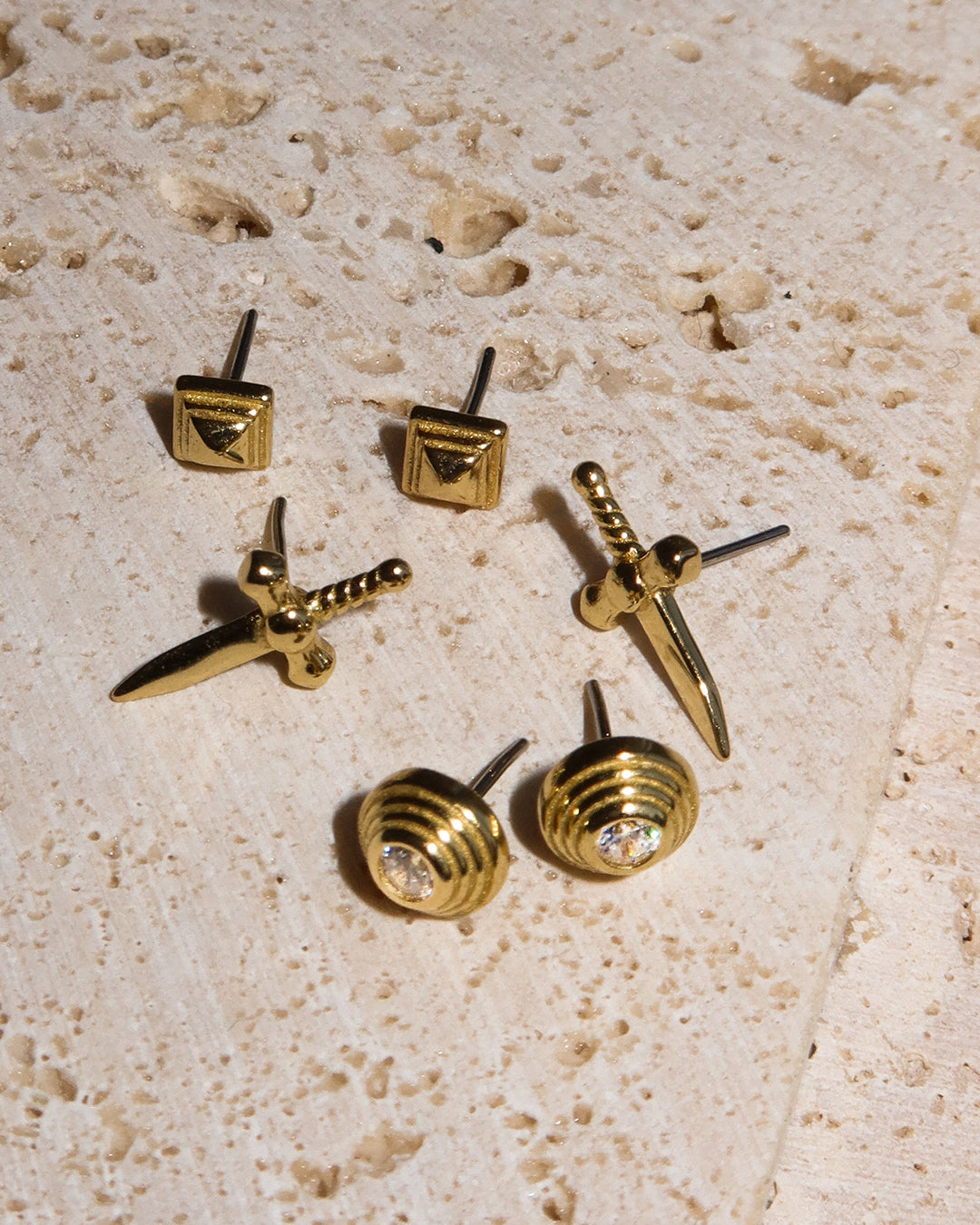 The Metal Step Cut Pyramid Studs